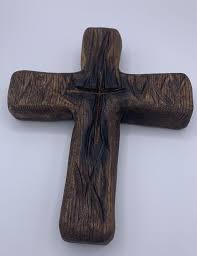 hand carved old rugged wooden cross