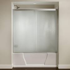 This unique frameless clear glass bathtub door not only keeps bathroom floors dry by stopping leaks. 60 In X 56 3 8 In Framed Sliding Bathtub Door Kit In Silver With Pebbled Glass Sdkit60 Sil R The Home Depot