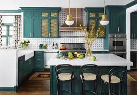 suzann kletzien with bold green cabinets