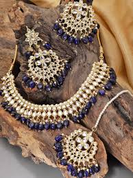 damani navy blue gold plated stone