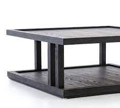 It offers plenty of space for storing magazines and documents. Modern 40 Square Coffee Table Pottery Barn