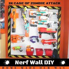 My son and his friends love having nerf battles in the neighborhood park, and we've collected quite the armory over the years! Nerf Wall Diy A How To Guide For Creating Your Nerf Gun Wall