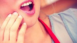 how to treat swollen gums near wisdom