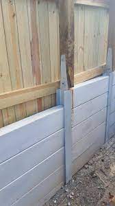 Combine Your Fence And Retaining Wall