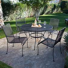 wrought iron outdoor dining table and