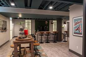 The problem with basements… the best basement flooring. Finished Basement Home Bar With Relaxing Lounge Space