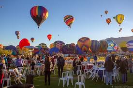 These life size gliding balloons walk with you when you tug on a string; Ultimate Guide To The Albuquerque Balloon Festival In New Mexico