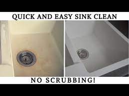 cleaning a white granite composite sink
