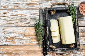 Er Margarine Block In A Wooden Tray