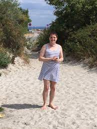 I went to the beach on my denmark vacation - summerdress helped a lot with  the heat : r/crossdressing