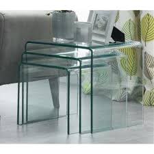 Simplistic and fresh, the coffee table features a 12mm curved piece of glass that will leave a lasting impression in your home. Modern Home Amalfi Curved Glass Bent Glass Nest Of Tables Free Next Day Delivery