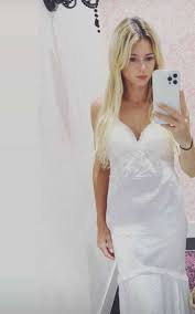 Camila Giorgi makes you dream with a white wedding dress and white lace  underwear