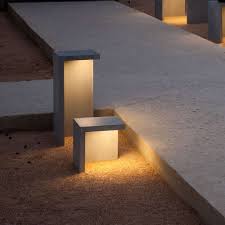 The Empty Led Outdoor Bollard Is A Sculptural Outdoor Light That Features Clean Sharp Lines Outdoor Lamp Modern Outdoor Lighting Bollard Lighting
