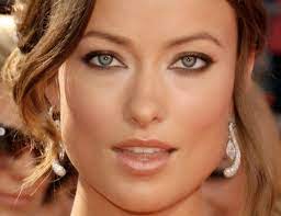 Apply a pressed powder shadow onto your eyelid with an eyeshadow brush, making sure to keep the color below the crease of your eye, cosenza says. Olivia Wilde Perfect Eyes Eye Liner Tricks Almond Shaped Eyes