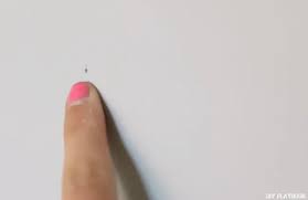 how to fix nail holes in your walls