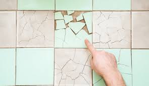 ignoring damaged bathroom tiles can