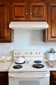 hanging microwave to a range hood