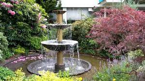 Water Fountain In A Garden Stock