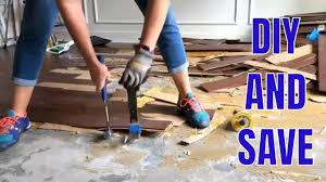 how to remove glued wood flooring and