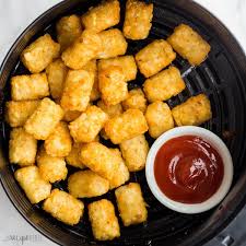 crispy air fryer tater tots ready in a