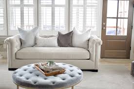 light gray tufted sofa design by
