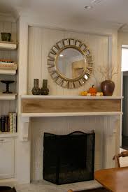 how to add wood trim above fireplace mantle