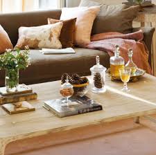 With the right decor, a coffee table can be the focal point of a living room design scheme. 56 Stylish And Practical Coffee Table Decor Ideas Digsdigs