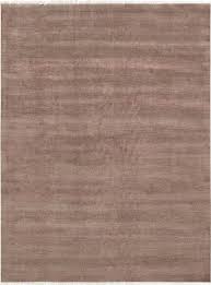 hand knotted silk and wool area rug