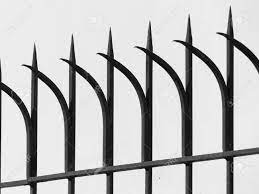 The spikes are built to make walking on the top of a fence with cat spikes installed incredibly dangerous and painful for cats. Old Fashioned Spike Fence On White Background Stock Photo Picture And Royalty Free Image Image 70014288