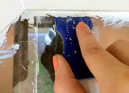 how to remove paint splashes from glass