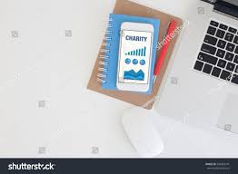 Business Charts Graphs On Screen Charity Stock Photo Edit