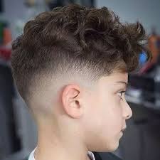 Loosely gather your girl's hair at the back of her head and twist it up. Haircuts And Hairstyles For Boys Hair Styling Tips For Boys Kids Sentinelassam