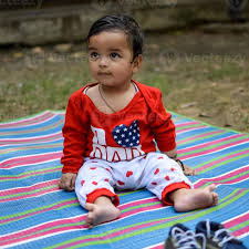 cute little indian infant sitting