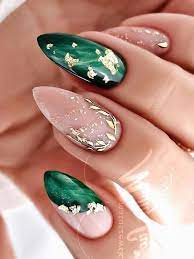 beautiful emerald green and gold nails