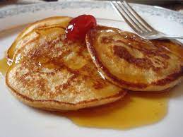 pover pancakes with peach compote