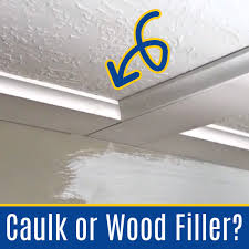 use caulk or wood filler on trim