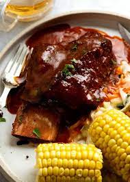 beef ribs in bbq sauce slow cooked