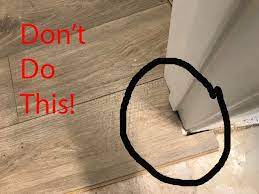 install laminate flooring around doors