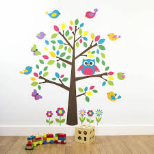 colourful owl tree with flying bird and