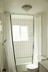 install a ceiling mounted shower curtain