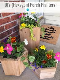 While they look like they're made of heavy stone, it's actually a lightweight blend of sand, cement, and fiberglass, making them easy to move around. Diy Porch Planters My Love 2 Create