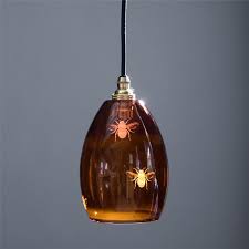 So my first video has had 10k views(?!) but i had several people comment/complain that they couldn't see me actually removing the glass in. Amber Etched Glass Bee Pendant Light