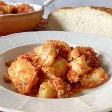 salt cod and potatoes in tomato sauce