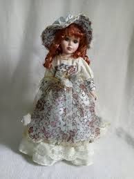 porcelain doll red hair blue eyes