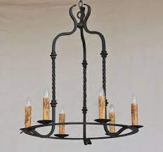 Spanish pendant lighting works especially well in narrow areas that would be easily overrun by the supreme elegance of spanish chandeliers. 1175 6 Contemporary Spanish Chandelier Spanish Revival Lighting