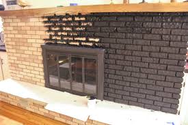 our black painted fireplace bright