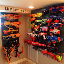 Make this easy diy nerf gun storage rack out of pvc pipe to hang them all in one place! Nerf Gun Wall