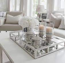 Books are common objects to decorate a coffee table with, but you can be more creative with them. 37 Best Coffee Table Decorating Ideas And Designs For 2018 Pretty Ways To Style A Coffee Table Table Decor Living Room Elegant Living Room Living Room Table