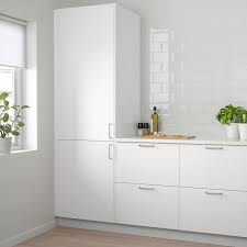 The eccentric rich aunt of the kitchen cabinet family: Veddinge Door White 15x30 Ikea