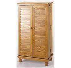 This versatile cabinet has two sliding doors that conceal five shelves, enough to accommodate 385 cds. Leslie Dame Cd 612v Wood Mission Style Cd Video Dvd Storage Cabinet With Louvered Doors Oak